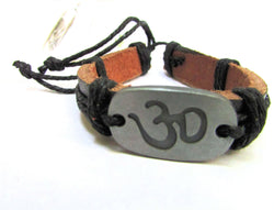 Silver tone Om yoga symbol metal charm engraved and black leather adjustable bracelet.
